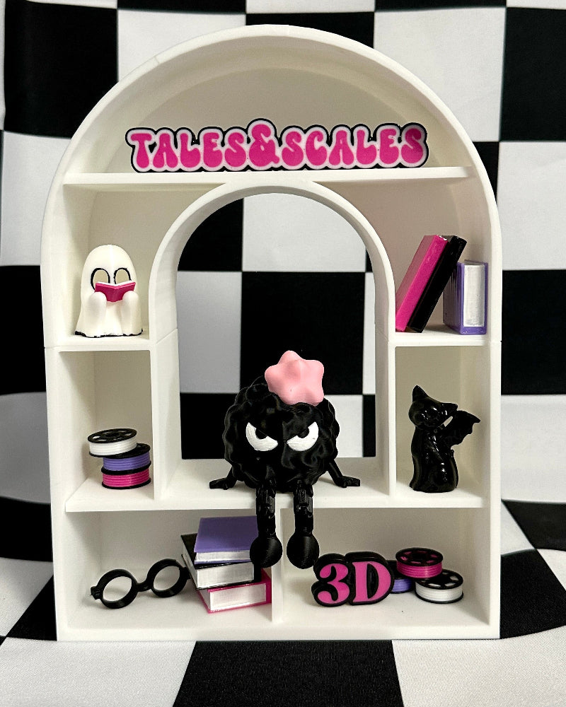 White shelf with decorative items against a black and white checkered background