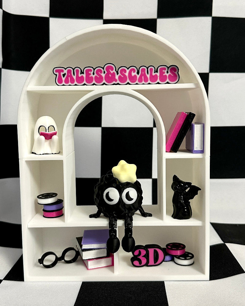 White shelf with decorative items on a black and white checkered background