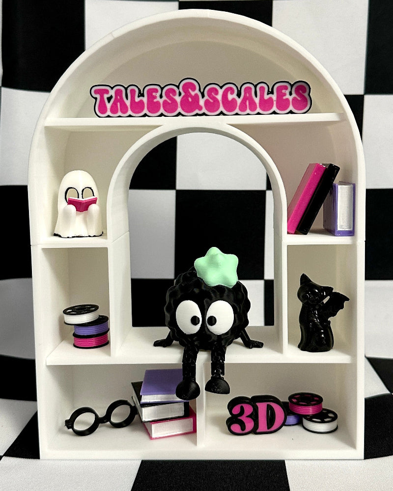 White shelf with decorative items against a black and white checkered background