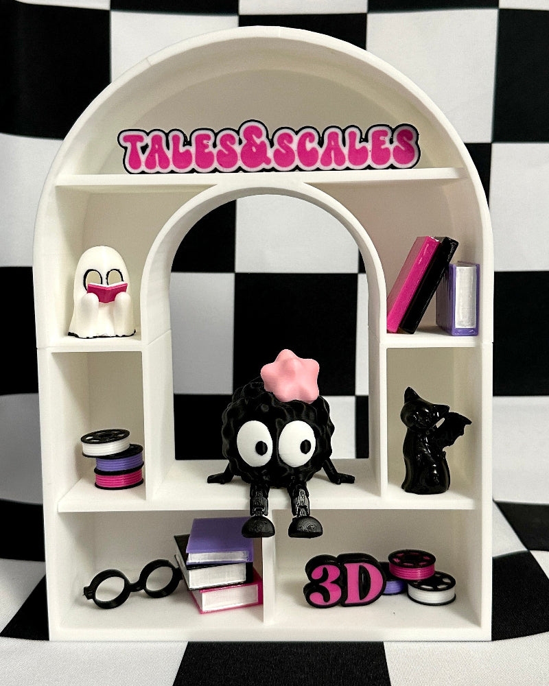 White shelf with decorative items against a black and white checkered background