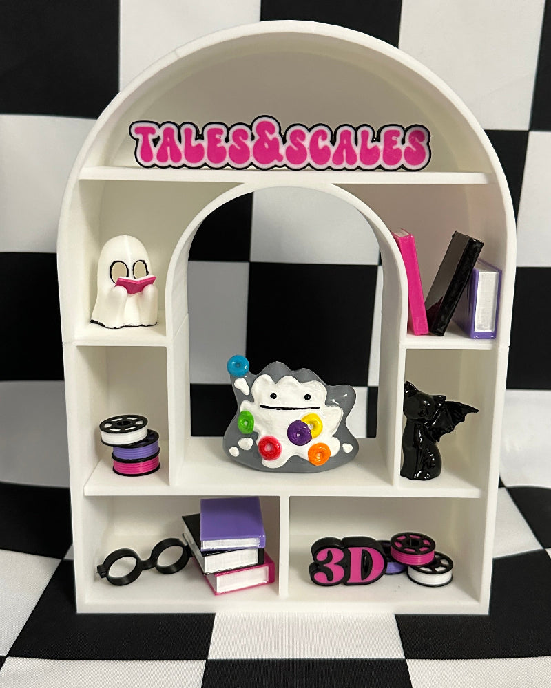 White arch-shaped shelf with various items against a black and white checkered background