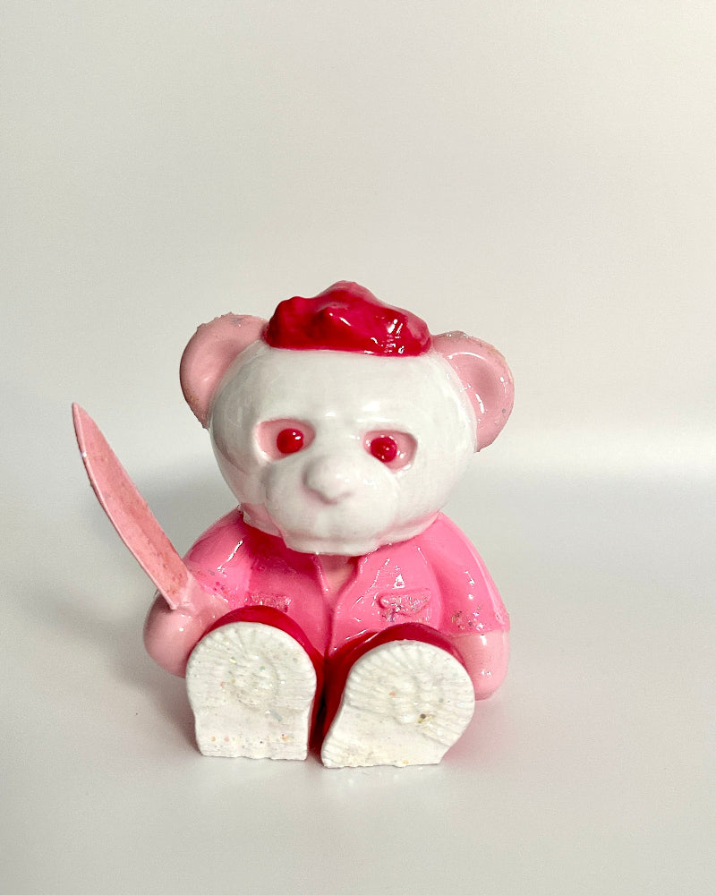 Animated character with a pink outfit and red hat on a white background