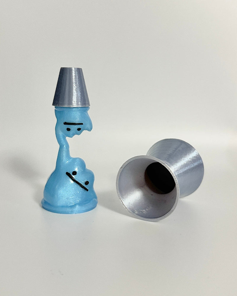 Blue and silver character with a metallic top on a white background