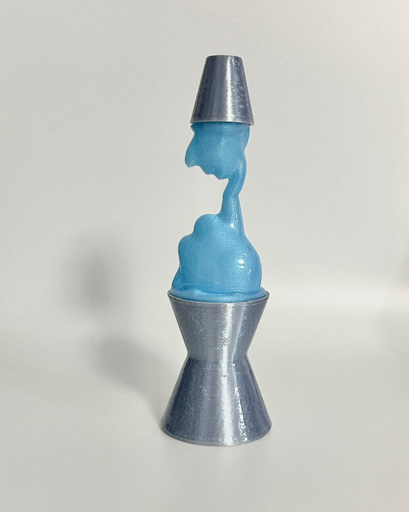 Blue and silver sculpture on a white background