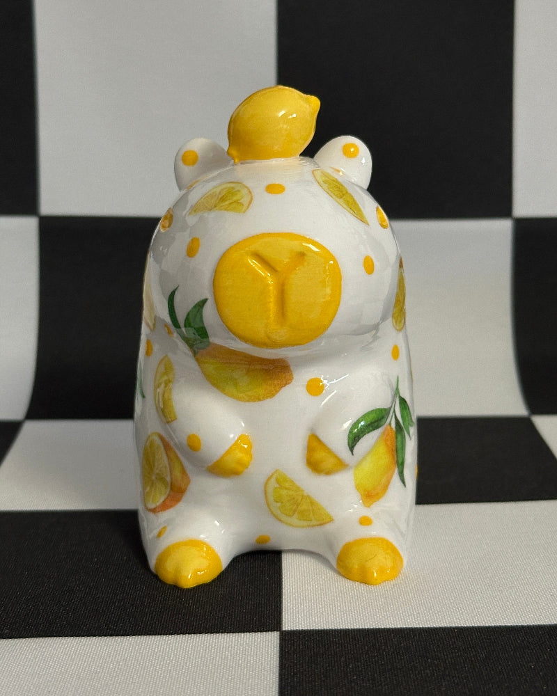 capybara with lemon design on a black and white checkered background