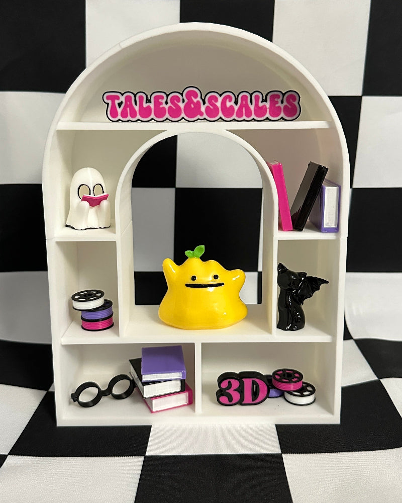 White shelf with decorative items against a black and white checkered background