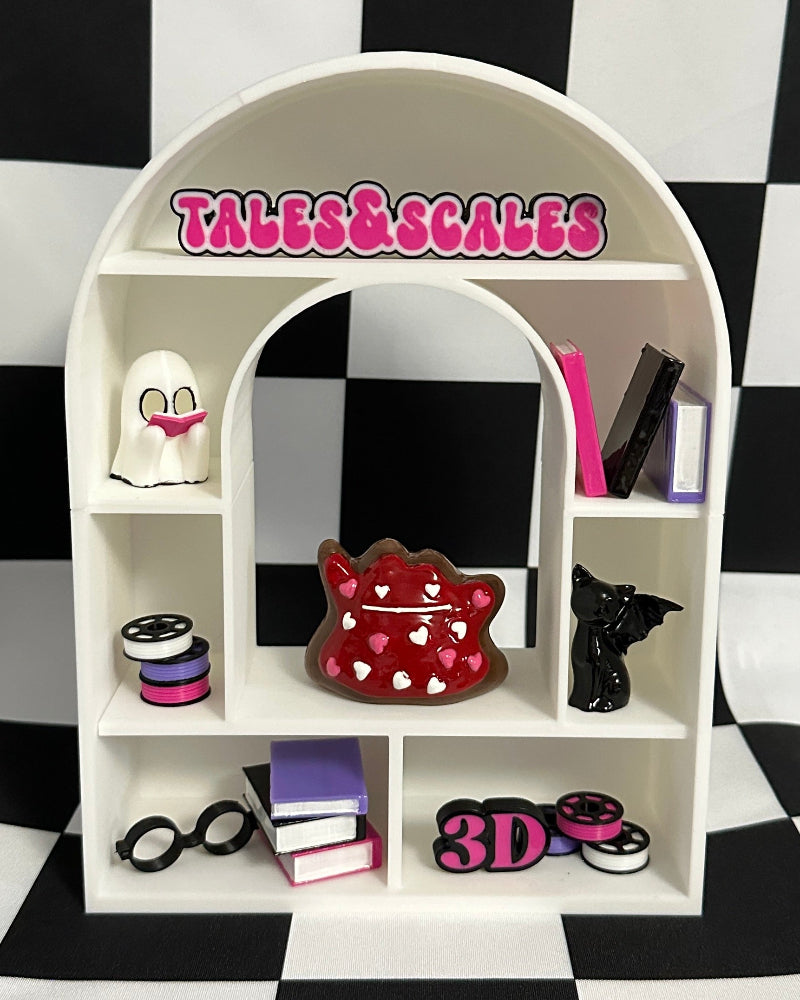 White shelf with decorative items against a black and white checkered background