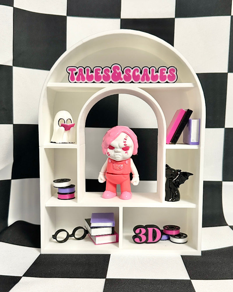White shelf with decorative items against a black and white checkered background