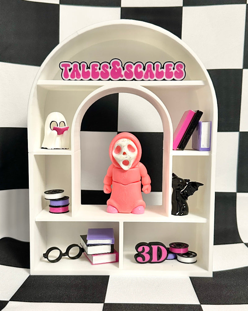 White shelf with various items against a black and white checkered background