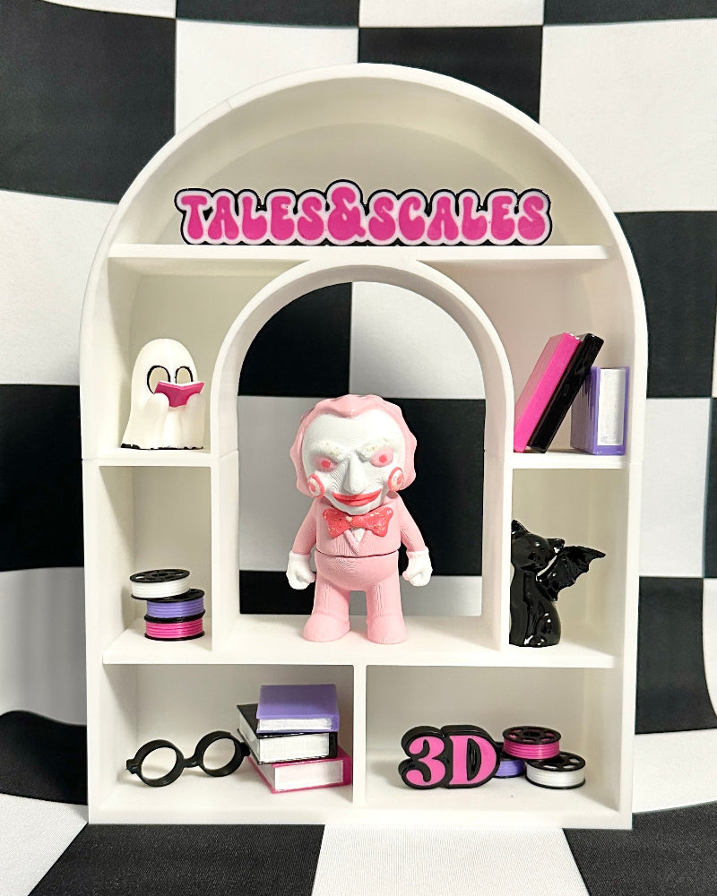 White shelf with cosmetic products against a black and white checkered background