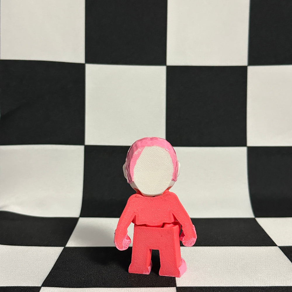 Pink figure with a hood on a black and white checkered background